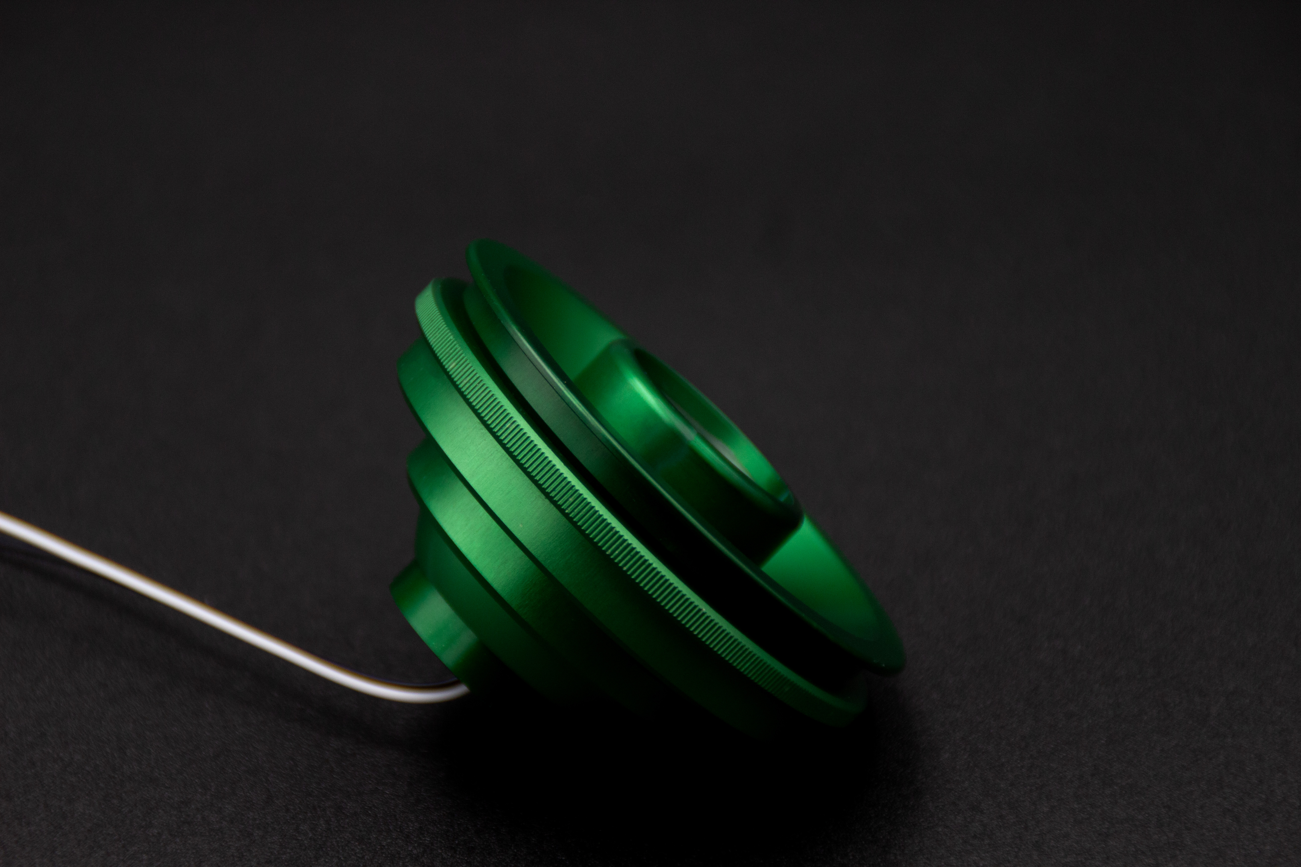 PWI custom LED reading light in green anodized finish, illuminated