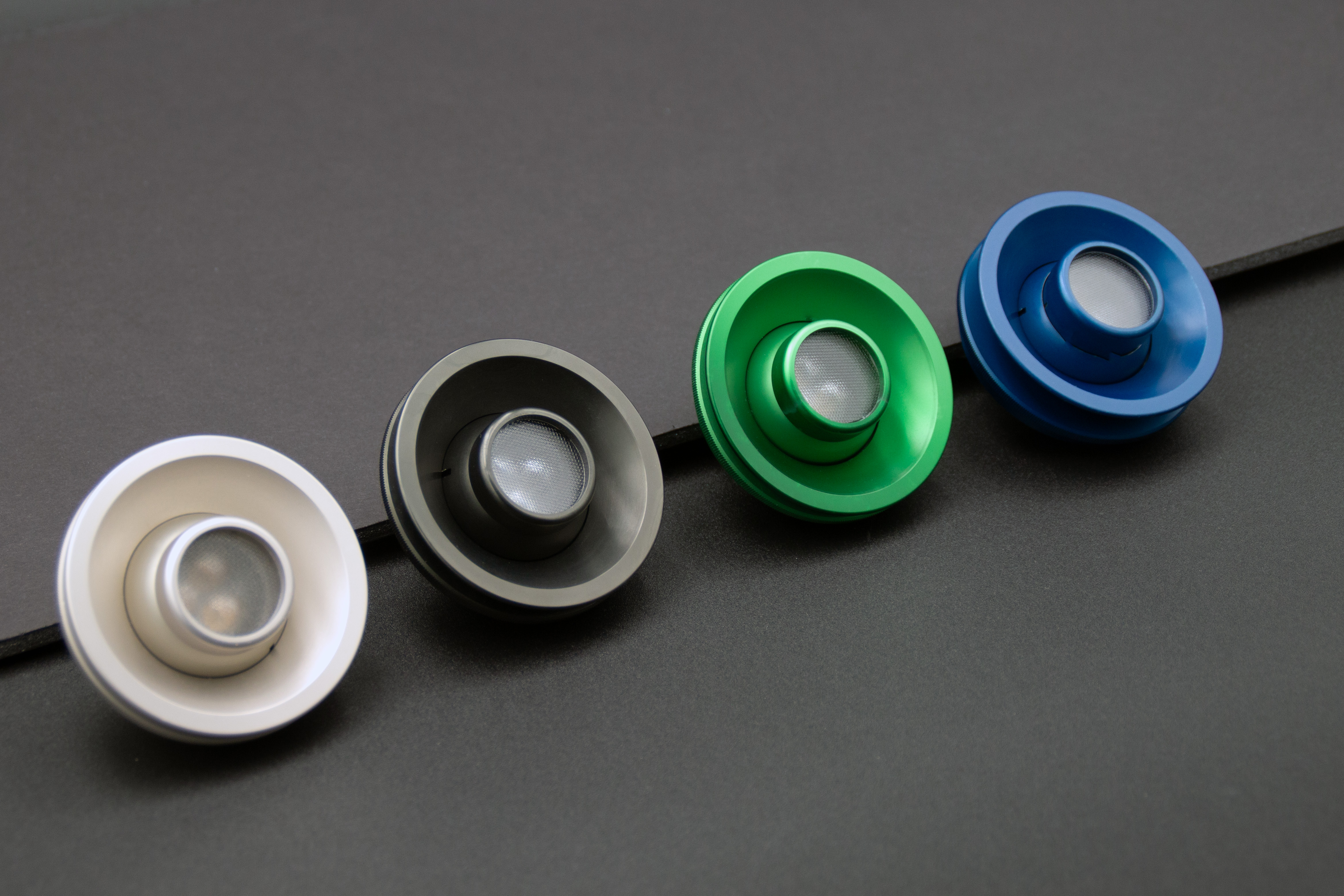 PWI custom LED reading lights in white, black, green, and blue anodized finishes