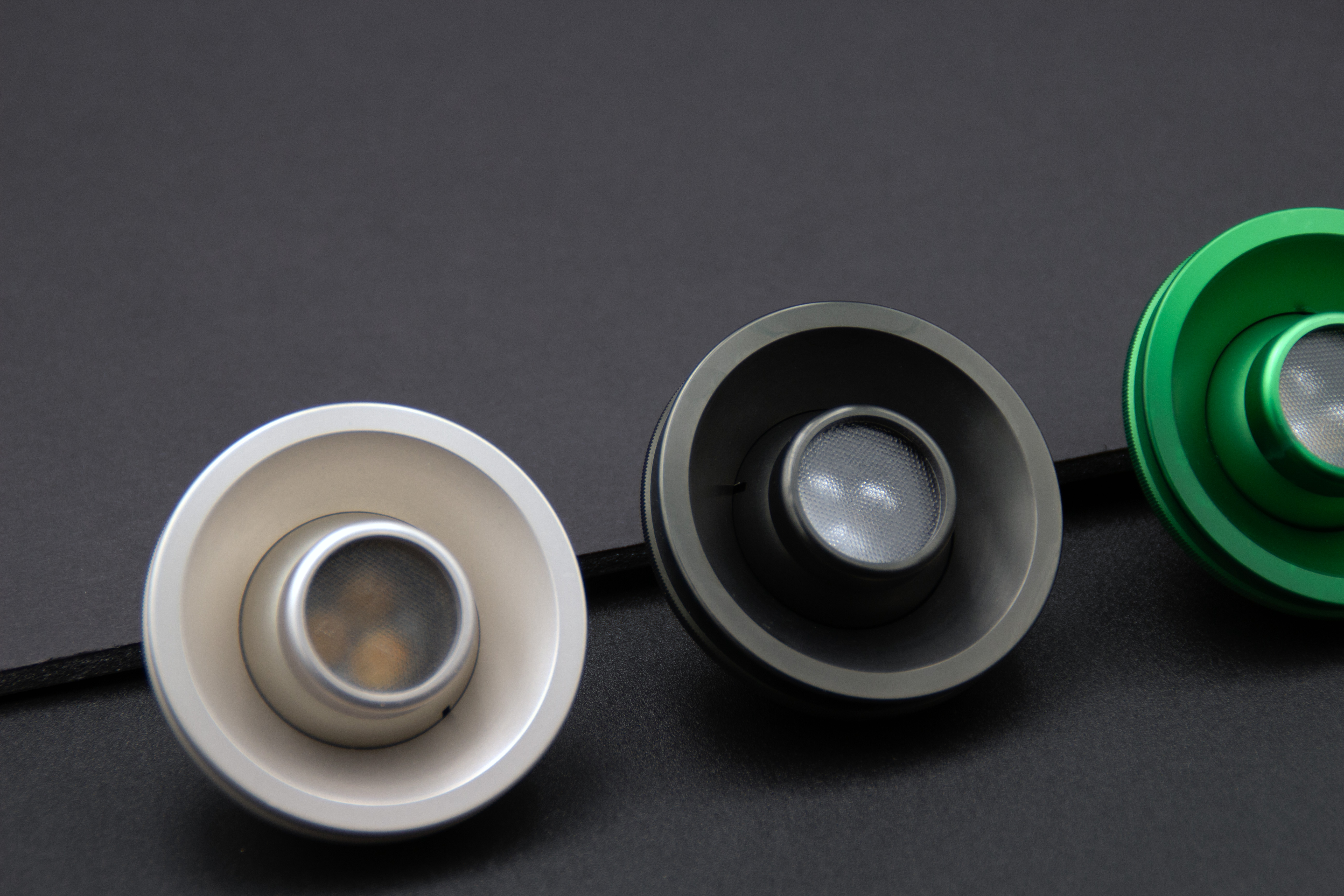 PWI custom LED reading lights in black, green, and blue anodized finishes