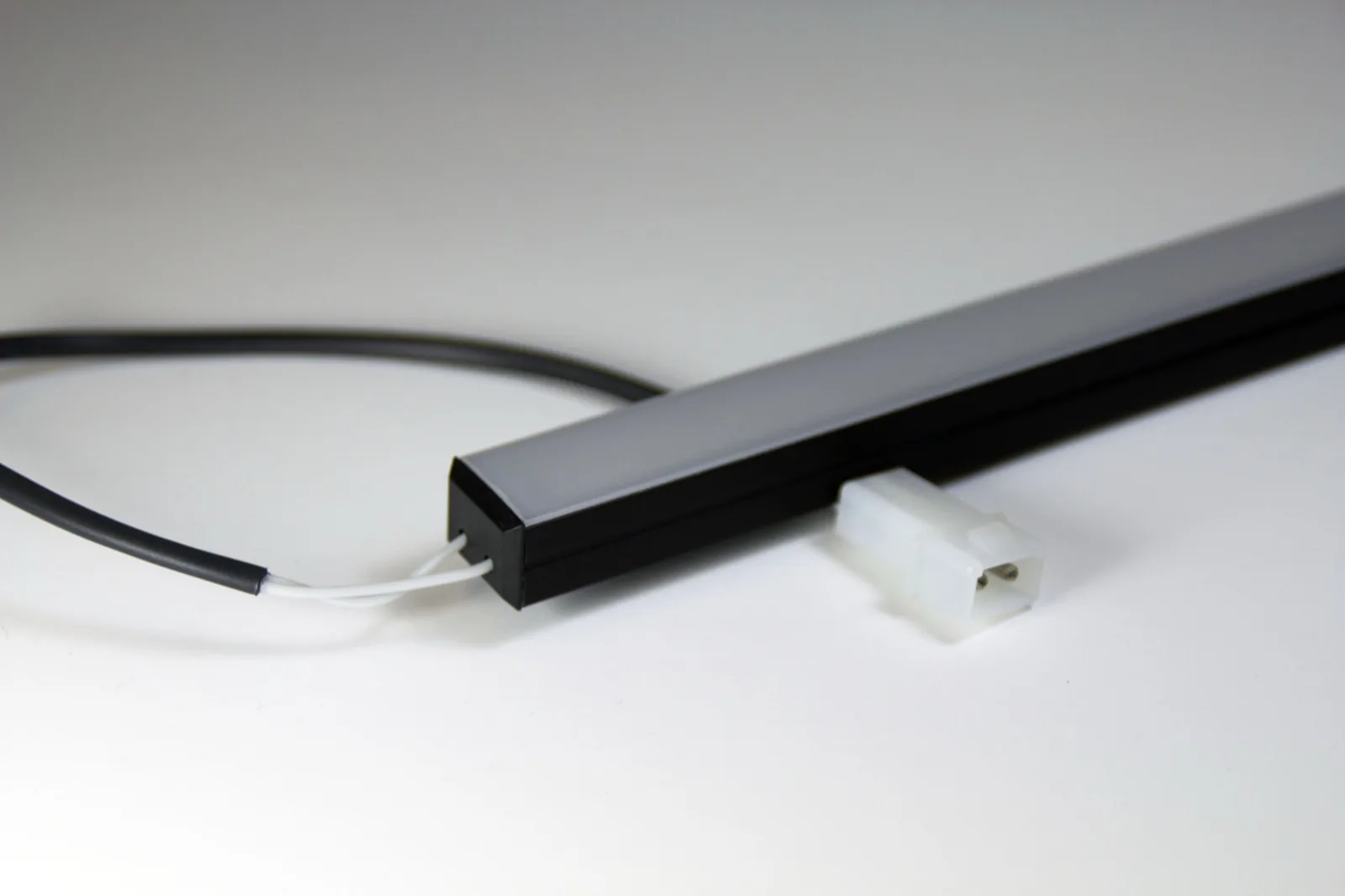 PWI Falcon 900B LED linear light bar &mdash; product shot with wire leads and connector