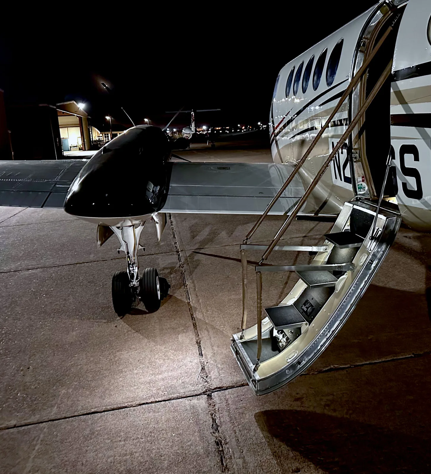 PWI LED entry door underwing light &mdash; side view aircraft night installation