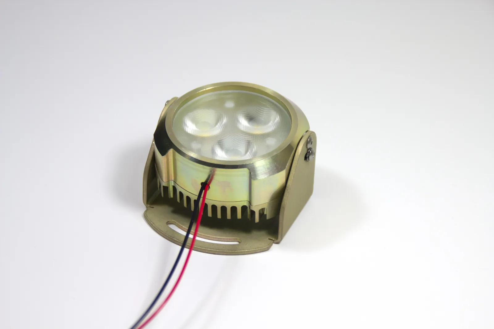 PWI LED logo light &mdash; product photo with lead wires draped forward