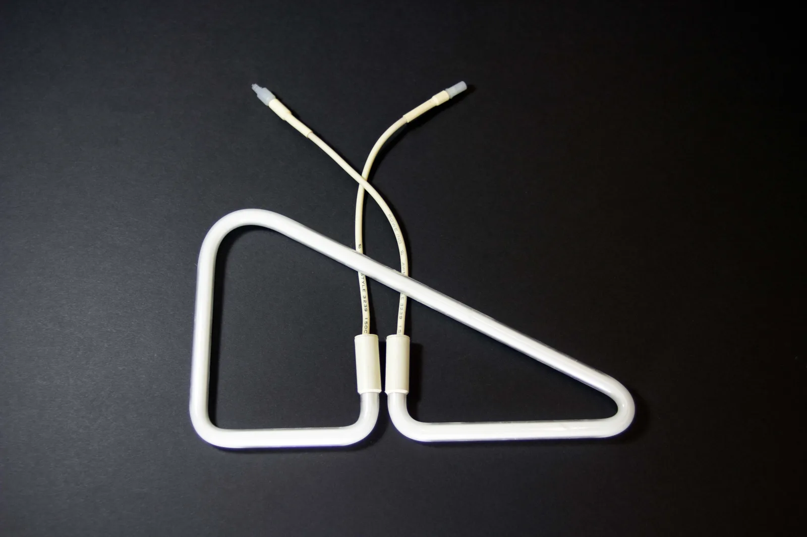 PWI fluorescent aircraft light &mdash; formed glass tube with lead wires, product photo