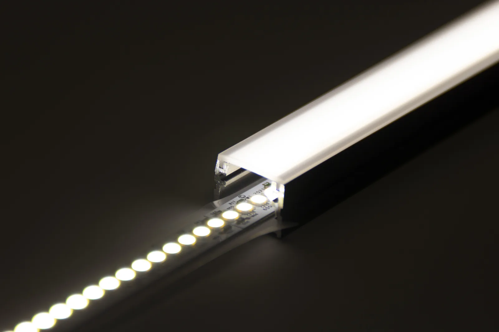 PWI LED linear light &mdash; end connector and LED strip close-up