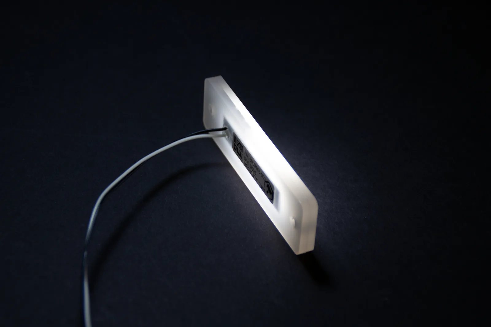 PWI Citation LED step light &mdash; product shot with lead wires