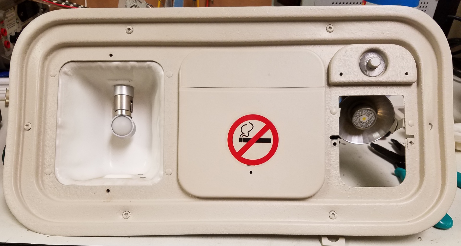 PWI 303 Right Angle LED Reading Light installed in aircraft cabin overhead panel