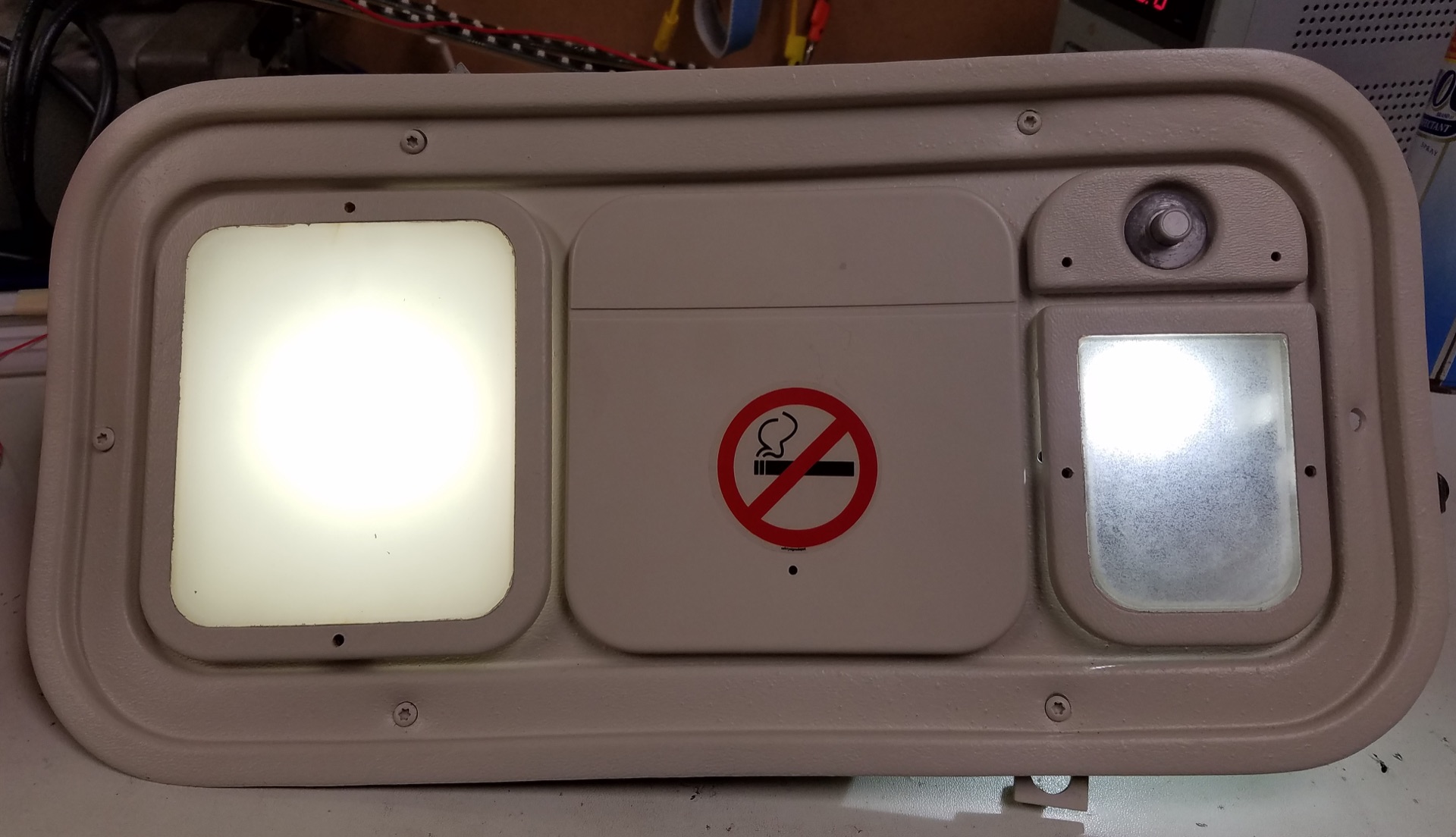 303 Right Angle LED reading light installed in Beechcraft 1900 PSU &mdash; lenses installed, lights on.