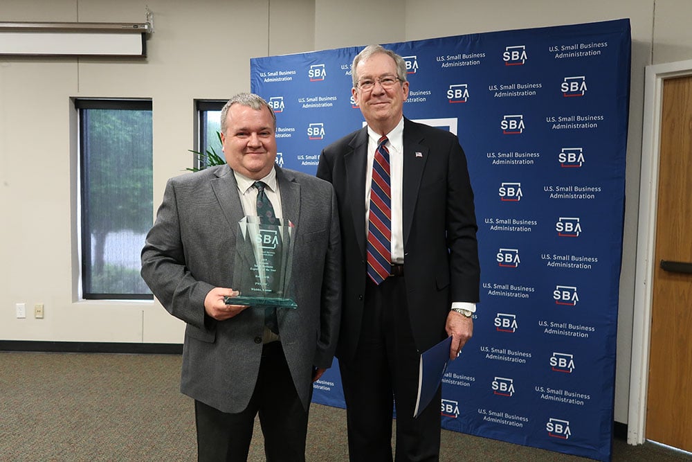 Chris Waggoner (PWI Director of Operations), Receiving the 2019 Kansas Small Business Exporter of the Year Award